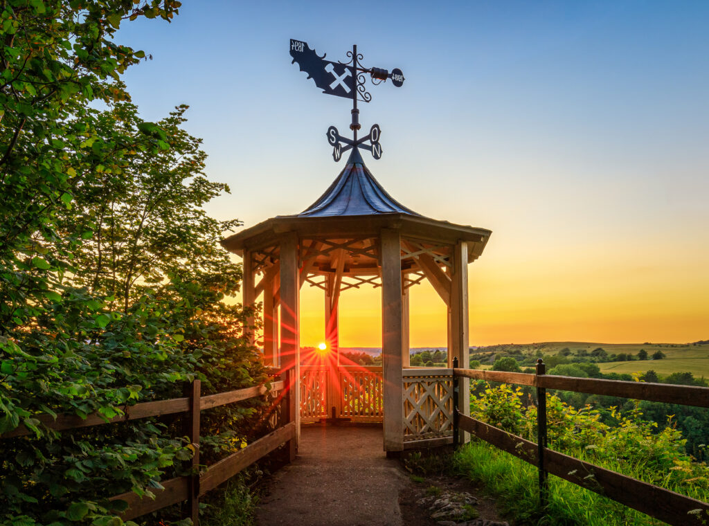 Chapel on a mountain at sunset